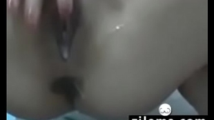 Skinny Chinese woman pulls pussy with artificial dicks in anal