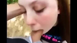Slurping teen blows outdoors. Gets nice cum on her face